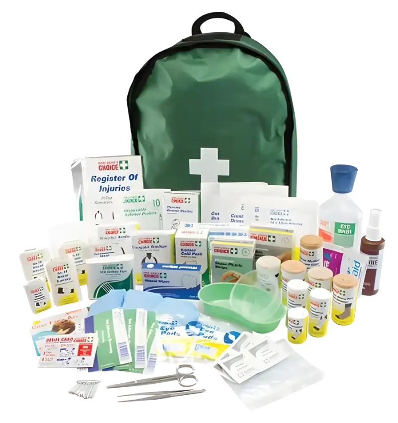 a photo of the 118865 backpack first aid kit. The backpack is green. Scissors, eye pads, resuscitation cards are in the front of the image, with a kidney dish, crepe bandages, triangular bandage and other dressings in the backround.