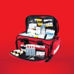 an image of a first aid kit on a red backdrop