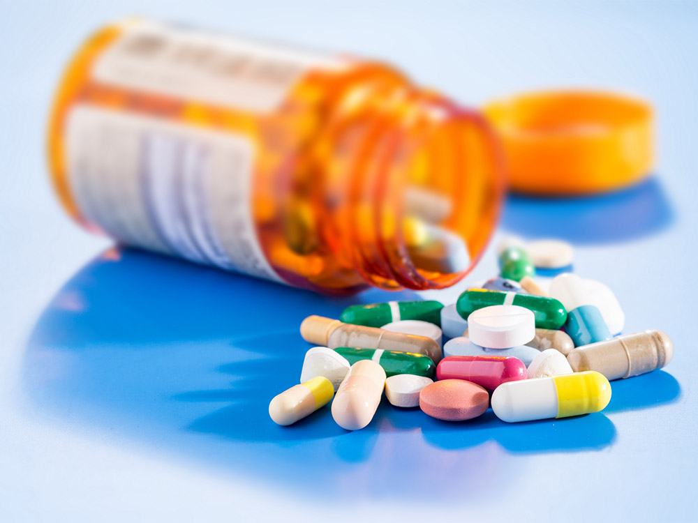 medication pills spilling